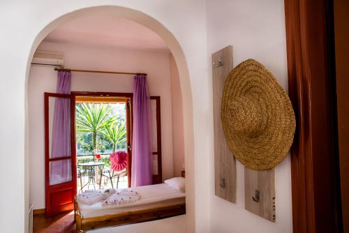 A bed or beds in a room at Kalypso studio Resorts