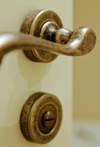 a close up of a metal faucet at Hotel Rural Salvatierra in Salvatierra de Tormes