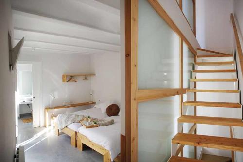 Postel nebo postele na pokoji v ubytování Can Girmas Casa de Turisme rural Navata