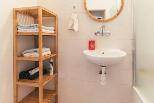 a bathroom with a sink and a mirror at Desert Zen in Mitzpe Ramon