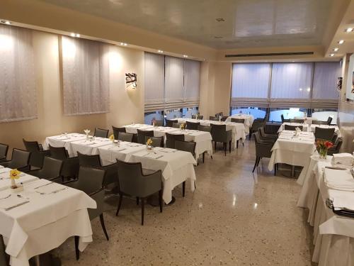 Um restaurante ou outro lugar para comer em Hotel Palace Bonvecchiati