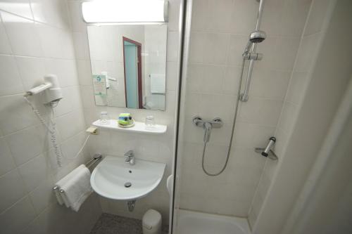 Ванная комната в Aparthotel Wangener Landhaus