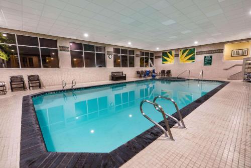 a large swimming pool with blue water in a building at La Quinta by Wyndham Idaho Falls/Ammon in Idaho Falls