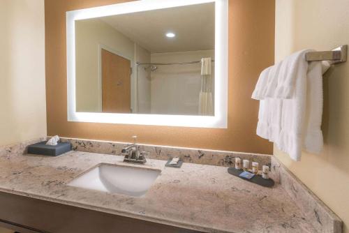 a bathroom with a sink and a mirror at La Quinta by Wyndham Idaho Falls/Ammon in Idaho Falls