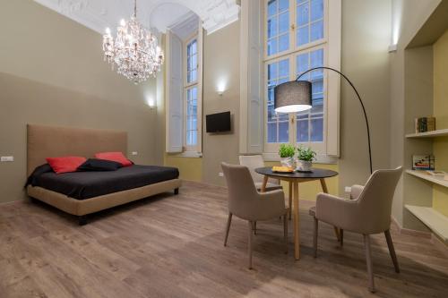 En eller flere senge i et værelse på Salvago 12