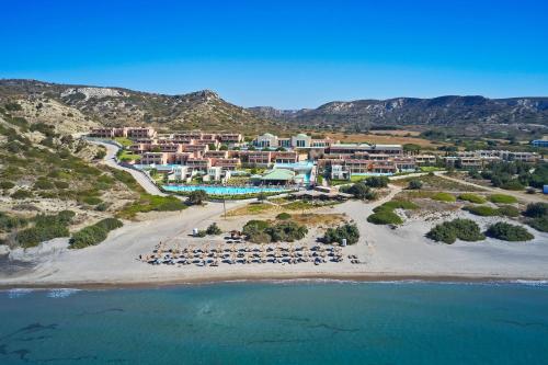 an aerial view of the resort and the beach at Atlantica Belvedere Resort - Adults Only in Kardamaina