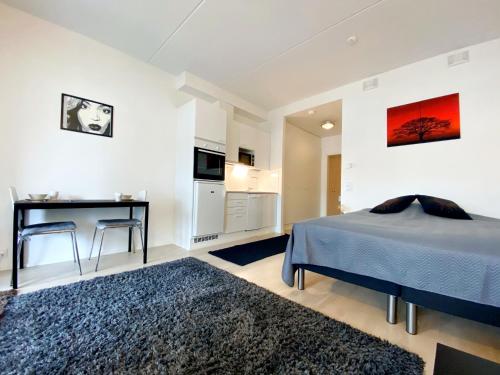 Postel nebo postele na pokoji v ubytování Avia Apartments Helsinki Airport