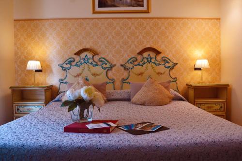 מיטה או מיטות בחדר ב-Venice Lion Residence - Vespucci