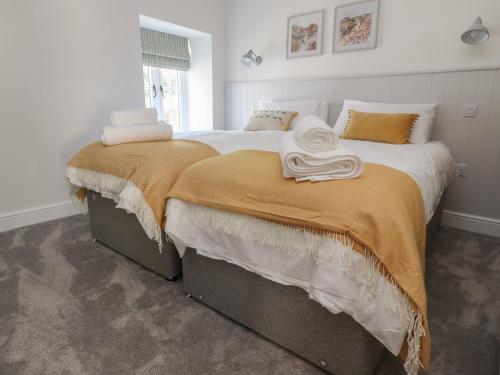 Voodi või voodid majutusasutuse Ghyll Cottage toas