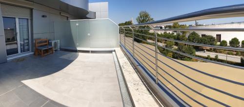 a view of a balcony of a building at Hotel Aleluia in Fátima
