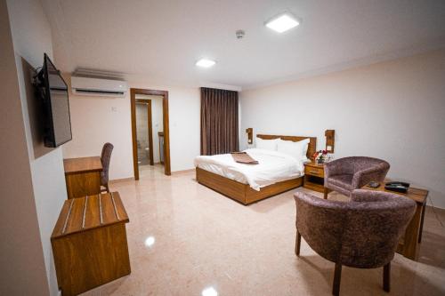 Katil atau katil-katil dalam bilik di Joar Beach Hotel