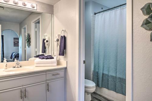 a bathroom with a sink and a toilet and a shower at Family Resort Condo with Perks in Branson! in Branson