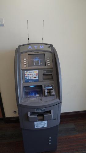 an atm machine is sitting on the floor at Holly Crest Hotel - Los Angeles, LAX Airport in Inglewood