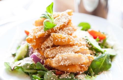 a plate of food with a salad with shrimp at The Salmon Inn in Galashiels