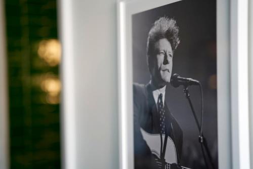 a woman is singing into a microphone at Hotel Magdalena in Austin