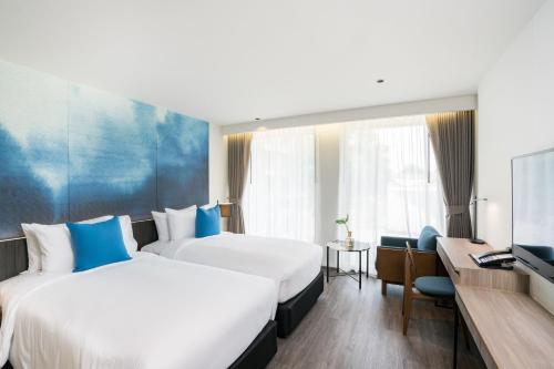 Katil atau katil-katil dalam bilik di Best Western Plus Nexen Pattaya