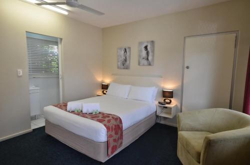 Tempat tidur dalam kamar di International Lodge Motel
