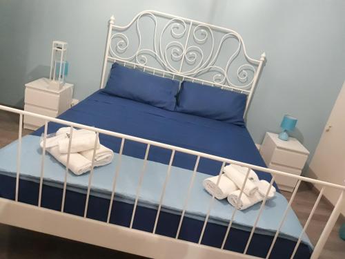 מיטה או מיטות בחדר ב-La terrazza sul vicolo