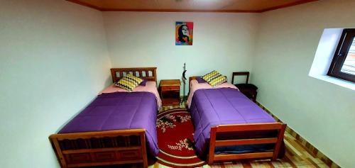 Tempat tidur dalam kamar di MeStizO HostaL