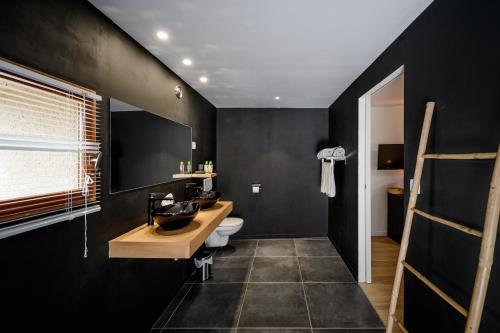 Kúpeľňa v ubytovaní Domaine du Conte Bleu