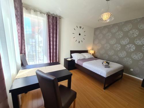 Ένα ή περισσότερα κρεβάτια σε δωμάτιο στο Lux Apartment Cosy