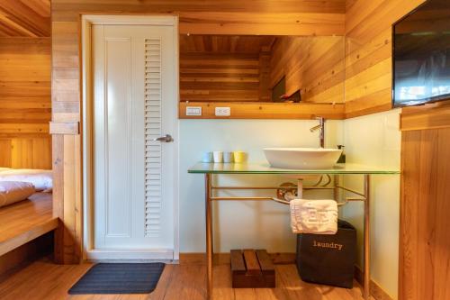 Cama o camas de una habitación en Lane 523埔里包棟庭園民宿