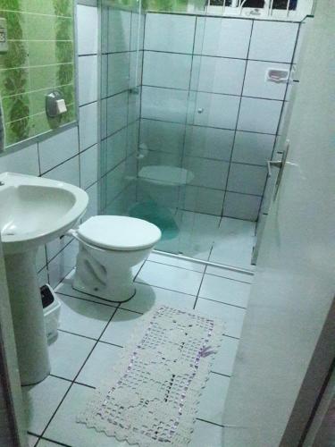 Ванна кімната в Pousada Hospedagem Rose's canela