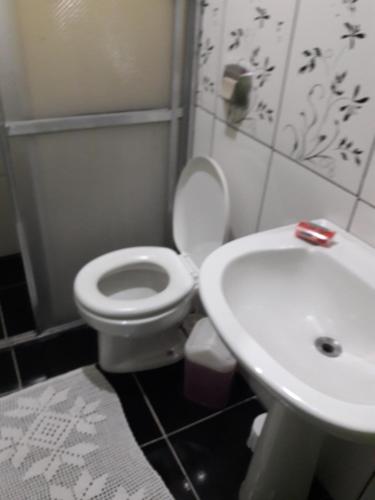 Ένα μπάνιο στο Pousada Hospedagem Rose's canela