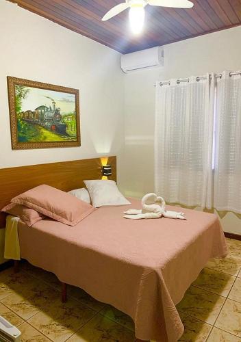 Ένα ή περισσότερα κρεβάτια σε δωμάτιο στο Hotel Avenida