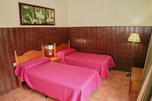 Tempat tidur dalam kamar di Finca Piñero