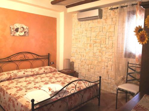 Ένα ή περισσότερα κρεβάτια σε δωμάτιο στο Agriturismo Pagliuzzo