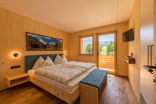 Postel nebo postele na pokoji v ubytování Residence Bergheim