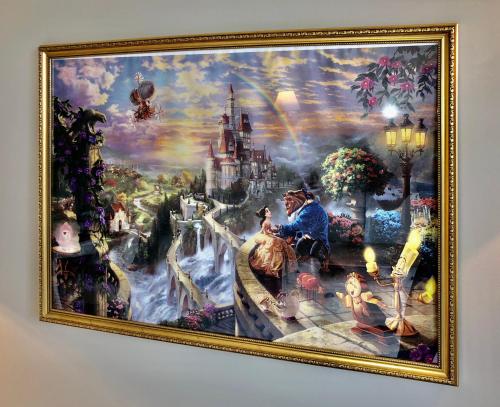 a picture of a painting of a castle at LA SUITE ENCHANTÉE Disneyland Paris in Serris