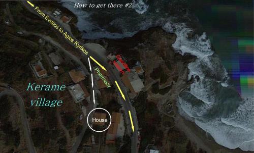 an overhead view of a road with a house at The House of Summer Winds in Évdhilos