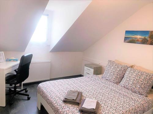 Tempat tidur dalam kamar di MyHome Basel 3B44