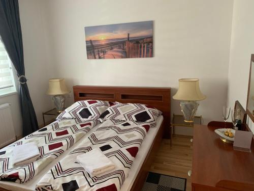 Ένα ή περισσότερα κρεβάτια σε δωμάτιο στο VEA Vienna Apartment