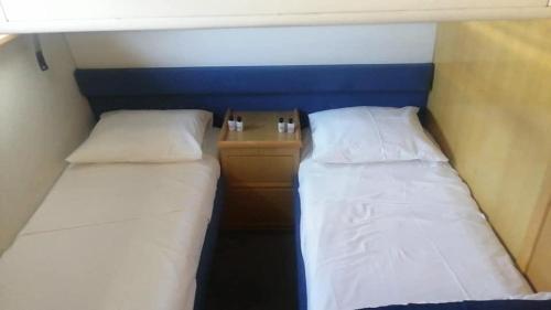 Voodi või voodid majutusasutuse Apartamento Barco Búzios III toas