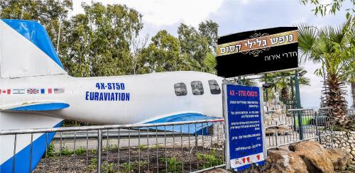 an airplane is on display in a museum at Magical in the Galilee in Qiryat Shemona