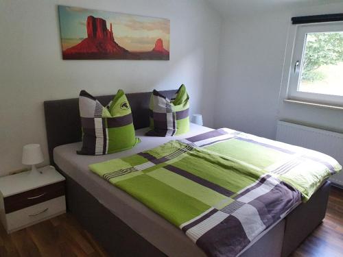 Postel nebo postele na pokoji v ubytování Ferienwohnung Stephanshausen