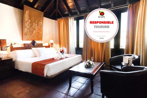 a hotel room with a bed and a sign that reads resonance tourism at Casa Palacio Pilar del Toro in Granada