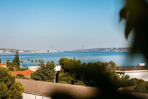 a view of a large body of water at THE miniPENTHOUSE terrace & SPA in Paço de Arcos