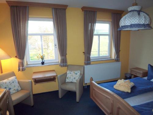 Postel nebo postele na pokoji v ubytování Hammermühle Hotel & Gesundheitsresort