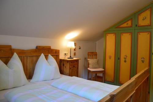 En eller flere senge i et værelse på Landhaus Kaulfuss