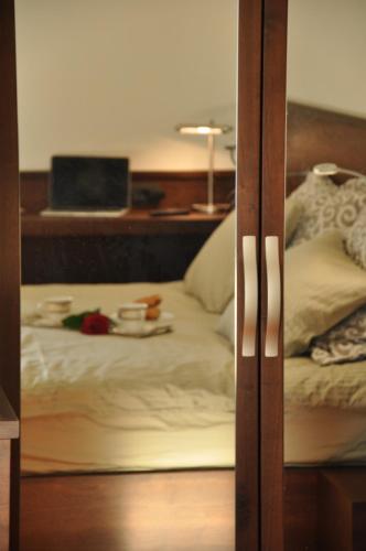 Postel nebo postele na pokoji v ubytování Apartman Lola