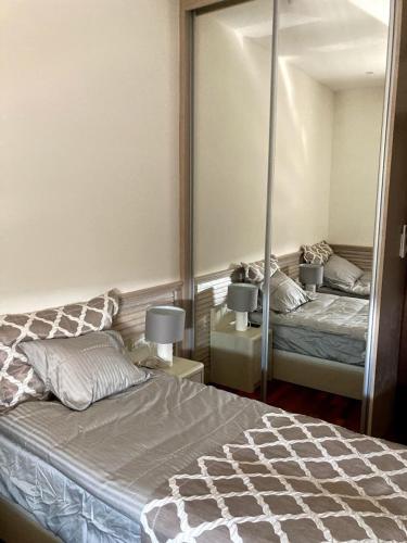 Postel nebo postele na pokoji v ubytování Apartman Lola