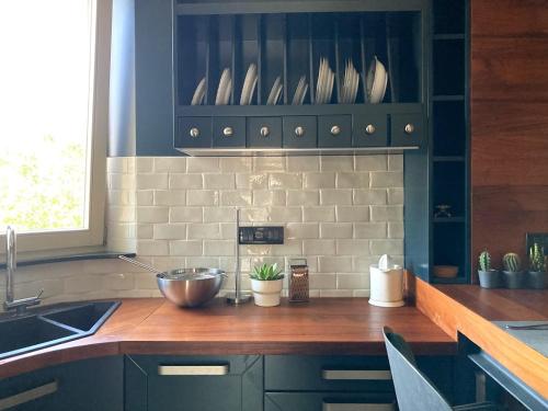 Kuchyň nebo kuchyňský kout v ubytování Apartman Lola