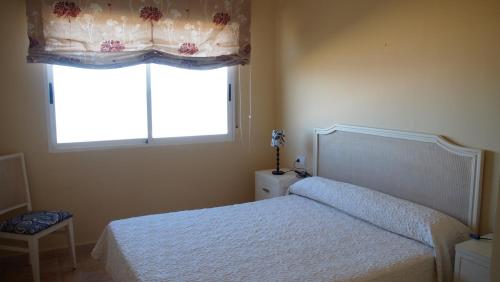 Postel nebo postele na pokoji v ubytování Marina Azul ElConserje