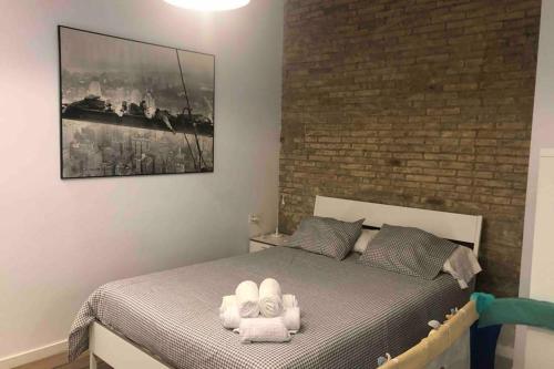 Giường trong phòng chung tại Fantástico Loft en centro ciudad planta baja