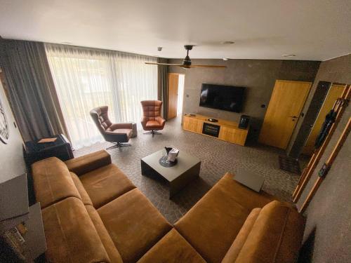 TV a/nebo společenská místnost v ubytování Penzión & Wellness MERIDIANA Bojnice rezort