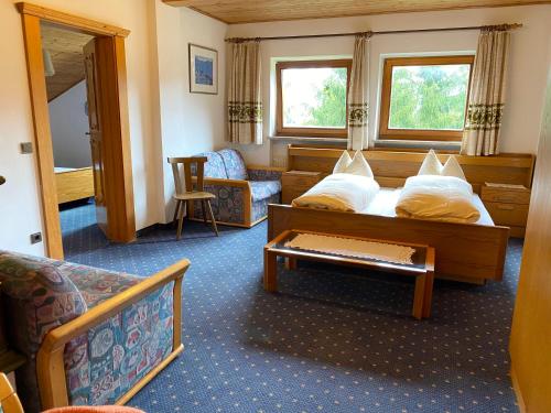Postel nebo postele na pokoji v ubytování Hotel Friedemann